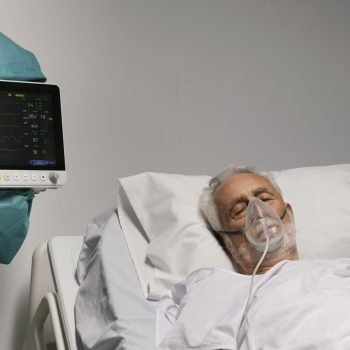 senior-man-breathing-with-special-equipment-hospital